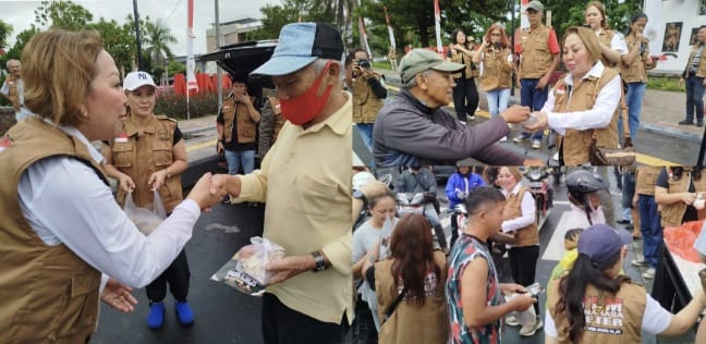 Kegiatan sosial dan sosialisasi Youla Lariwa Mantik sebagai bakal Cabup Minahasa di jalan depan Kantor Bupati Minahasa dan Lapangan Godbless Tondano, Sabtu pagi (03/08/2024). Foto: Ist.